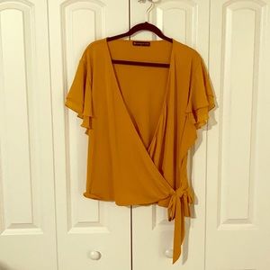 EUC mustard wrap top with flutter sleeve